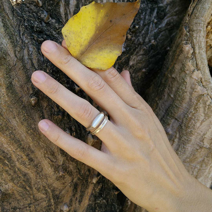 Delicate symmetrical silver ring