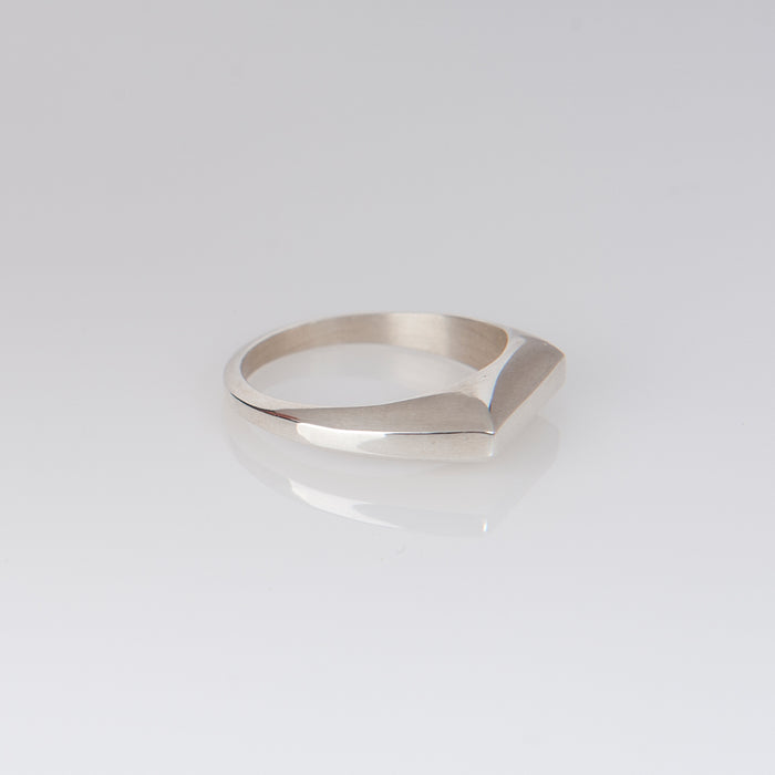 Delicate symmetrical silver ring