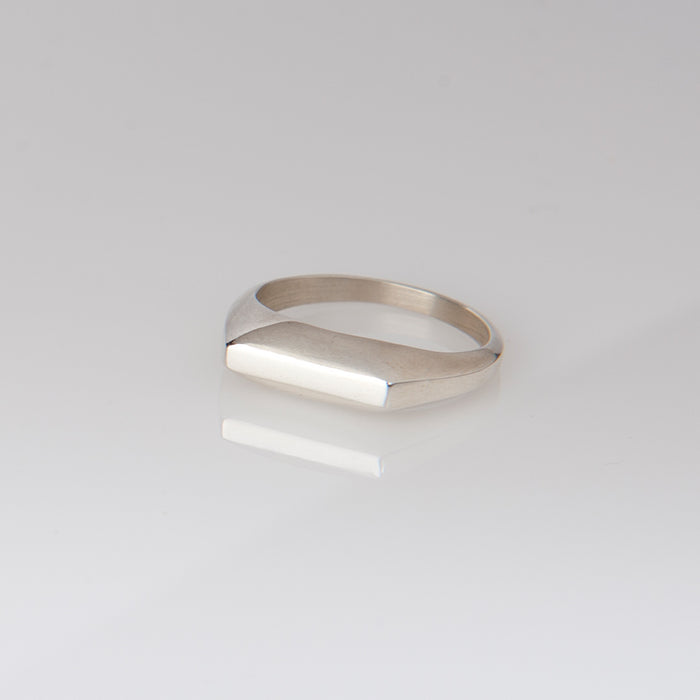 Delicate symmetrical silver ring