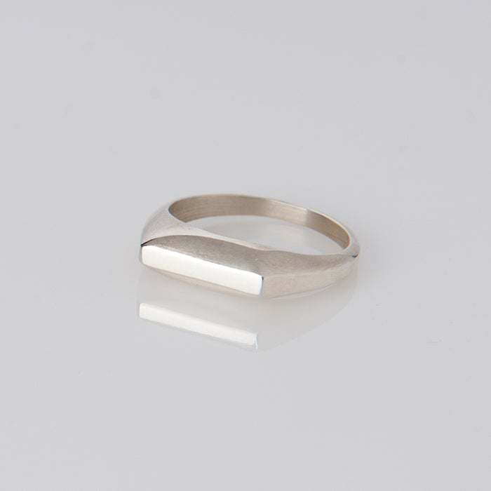 Delicate symmetrical silver ring