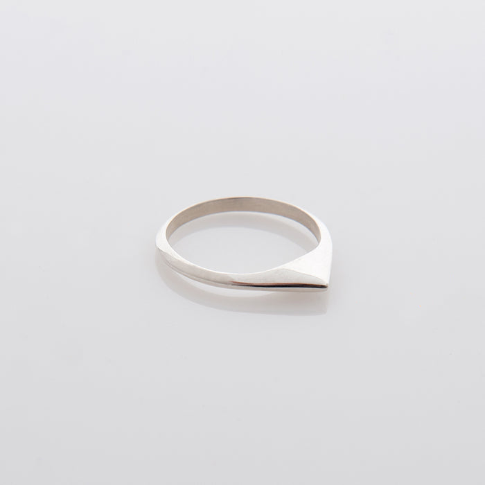 A thin pointed silver ring