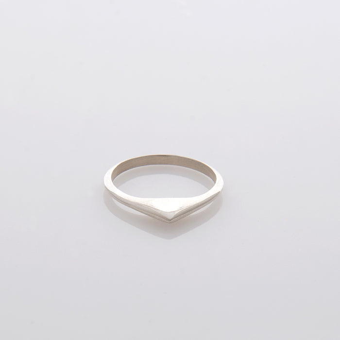 A thin pointed silver ring