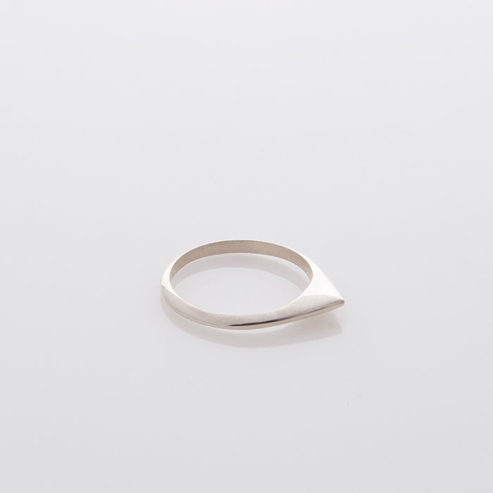 A thin pointed silver ring